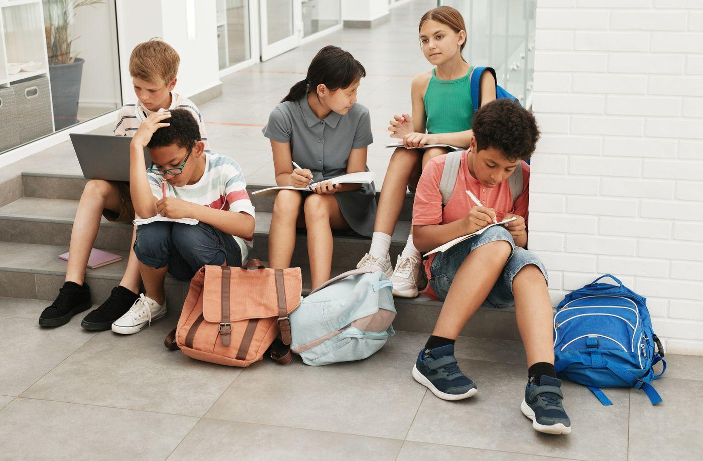 Young learners working through a project together